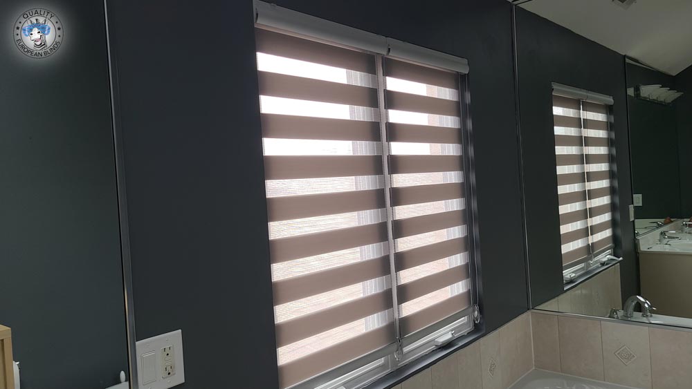 Neutral zebra blinds fitted in a bathroom