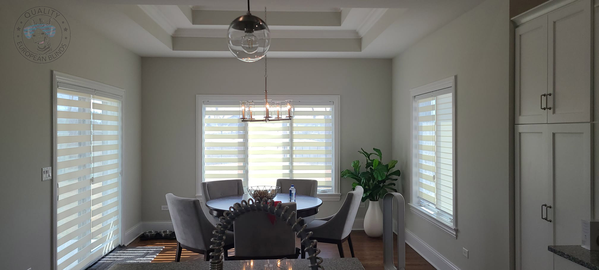 White day and night blinds in a modern open-plan home